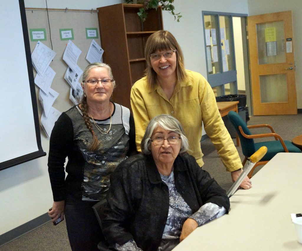 Photo from Gender Justice and Indian Residential School Claims Process. 
(R) Cindy Hanson, researcher, (L) Judy Hughes, Community collaborator from Saskatchewan Aboriginal Women's Circle, and (C) Viola Gordon, Elder and Study Participant.